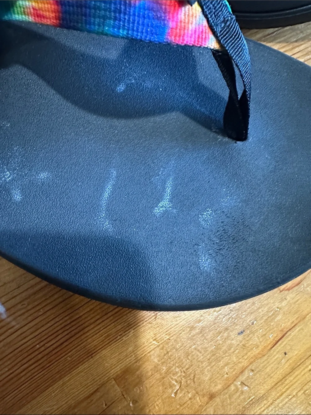 Chaco Black Flip Flops with Rainbow Tie-Dye Straps